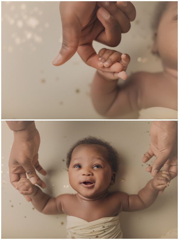 Canberra baby photographer, tiny baby hand gently clasping dads finger, with the baby smiling joyfully in the next frame, surrounded by soft starry speckles